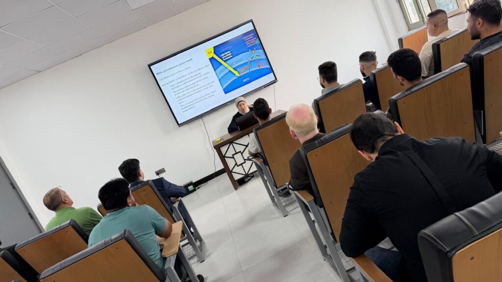 A Scientific Seminar Discusses Global Warming: Causes and Environmental Impacts